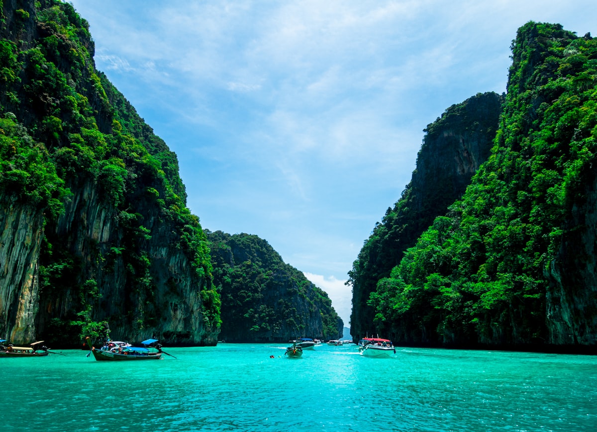 Phuket beach with turquoise waters and limestone cliffs